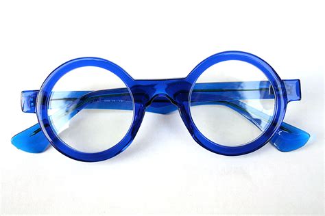 round blue frame sunglasses futuristic